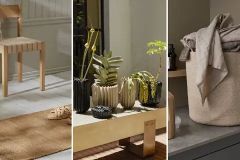 Detalles de un hm home: silla de madera, plantas en macetas texturizadas y cesta de lavandería de yute.