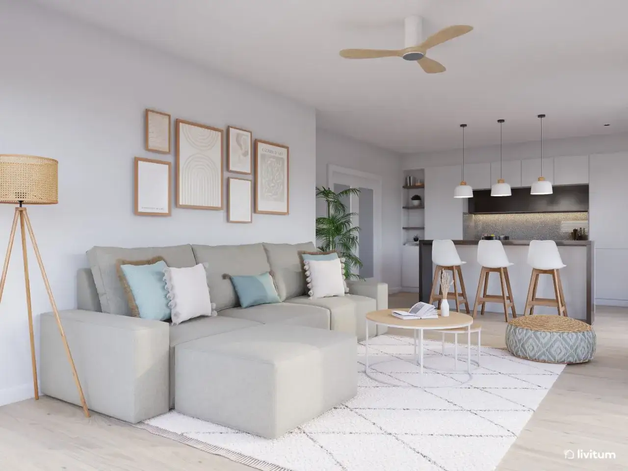 Un salón moderno y luminoso con sofá modular, mesa de centro, alfombra y cocina integrada. Un espacio ideal para tu kenay home.