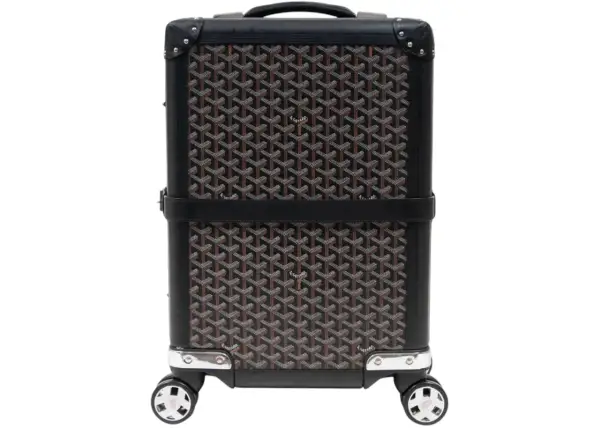 Maleta Goyard con estampado clásico en negro y marrón, detalles en cuero y ruedas plateadas.